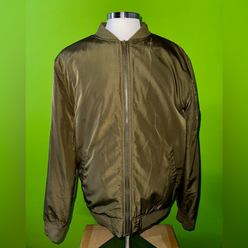 Olive green bomber jacket.
